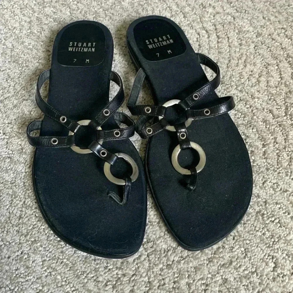 Stuart Weitzman Black Flat Sandals with silver metal accents